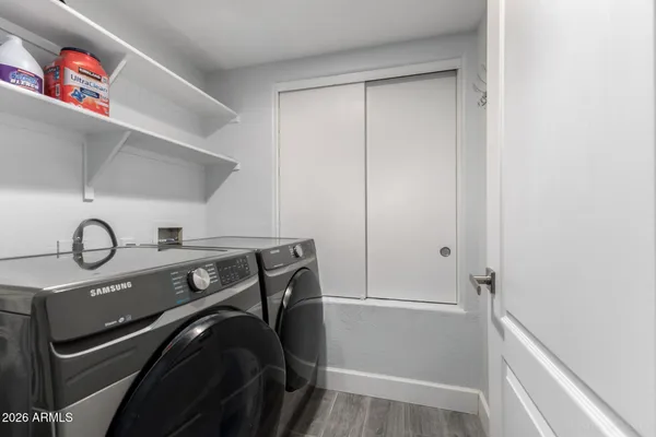 a utility room with dryer and washer