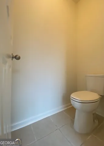 a bathroom with a toilet