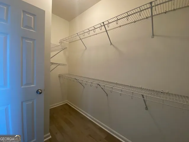 a view of a room with racks on the wall