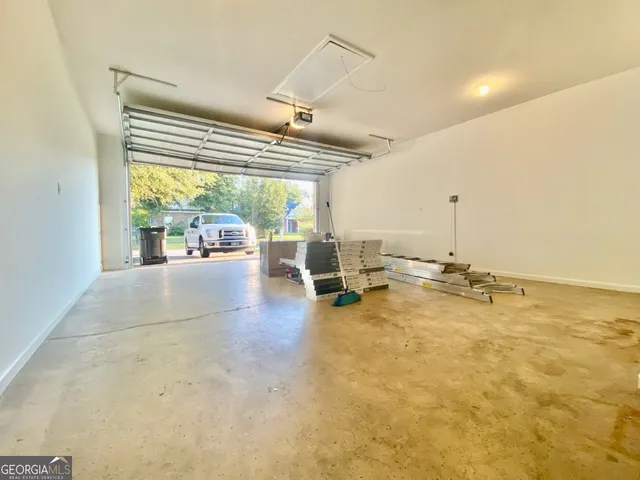 a big house with a big yard and large trees