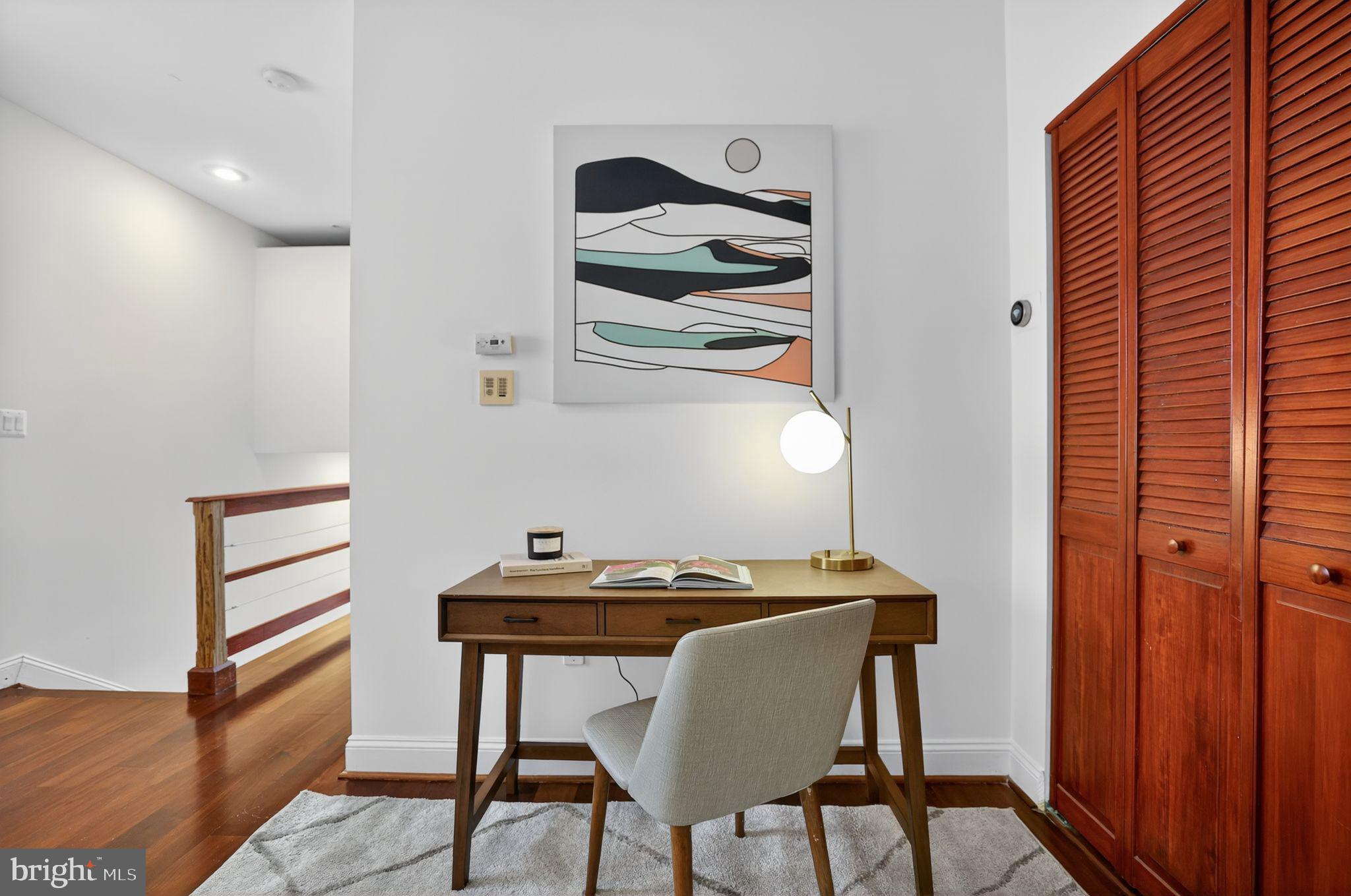 3573 Warder Street Northwest, Unit 7 Washington, DC 20010 - Photo 28 of 61 a view of a workspace area with furniture