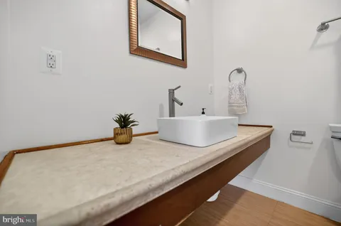 a bathroom with a shower and a bath tub