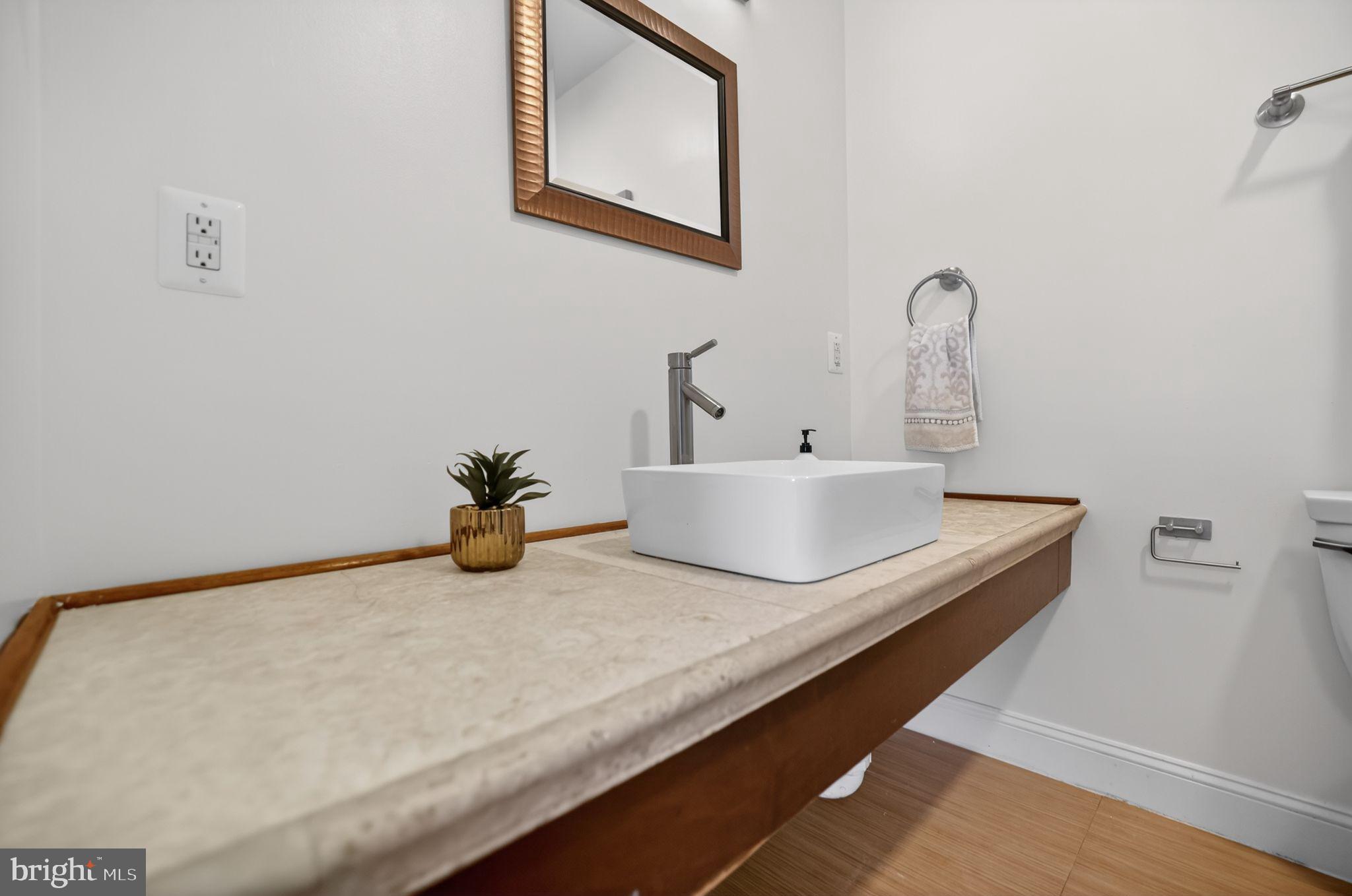 3573 Warder Street Northwest, Unit 7 Washington, DC 20010 - Photo 36 of 61 a close view of sink and tap