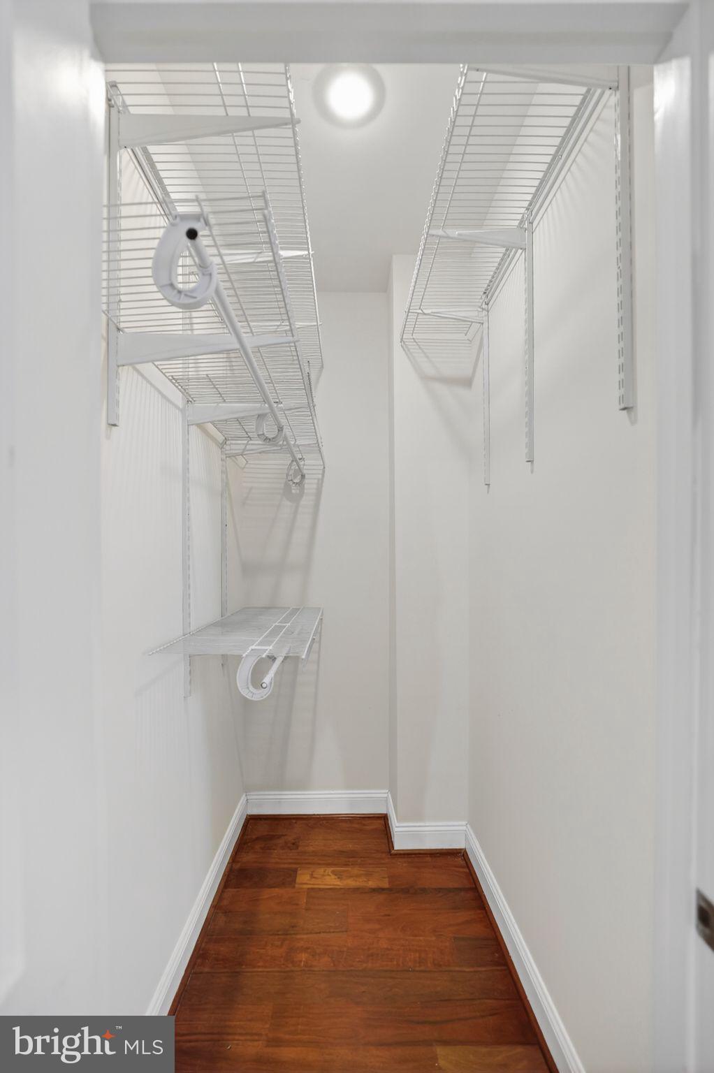 3573 Warder Street Northwest, Unit 7 Washington, DC 20010 - Photo 39 of 61 a view of a room with racks on the wall