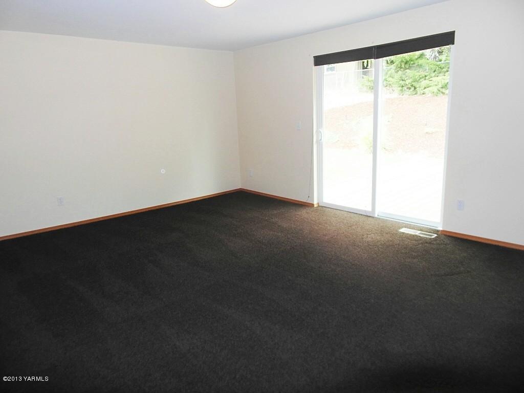 508 Canyon Road Yakima, WA 98901 - Photo 11 of 31 a view of an empty room with a window