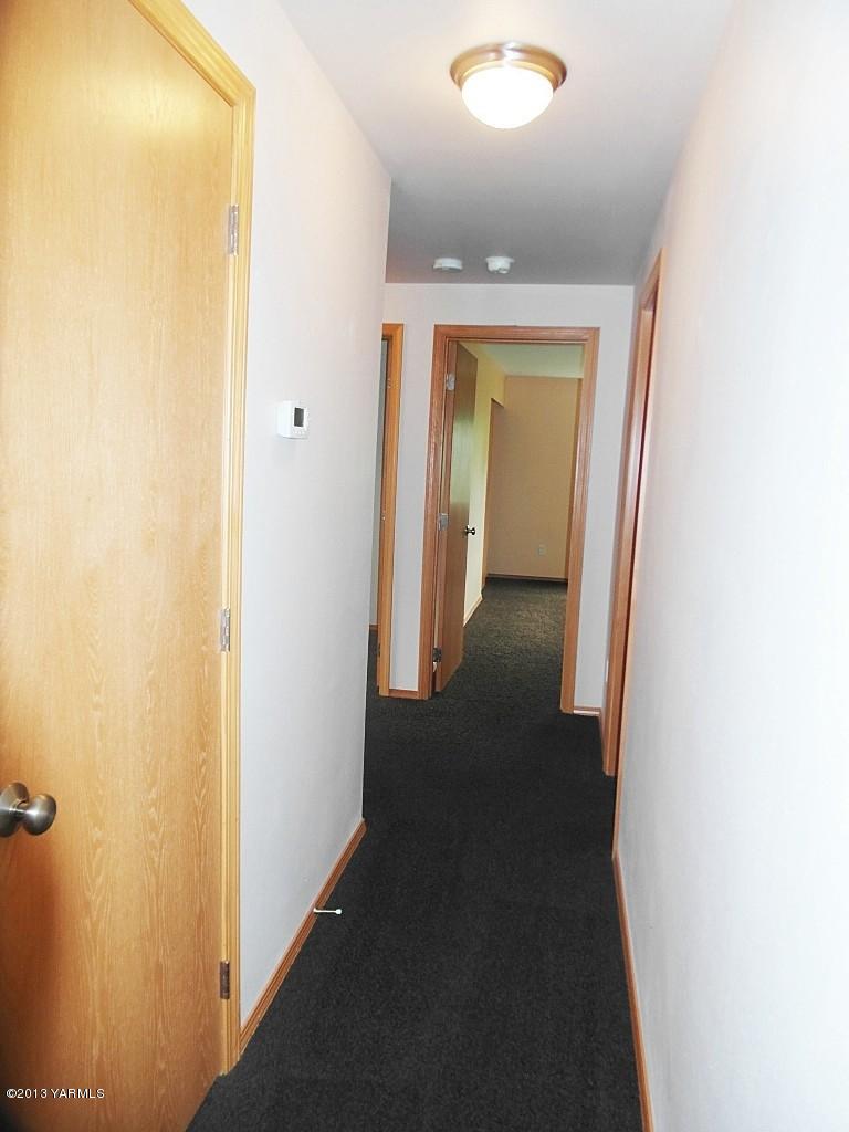 508 Canyon Road Yakima, WA 98901 - Photo 18 of 31 view of a hallway with wooden floor