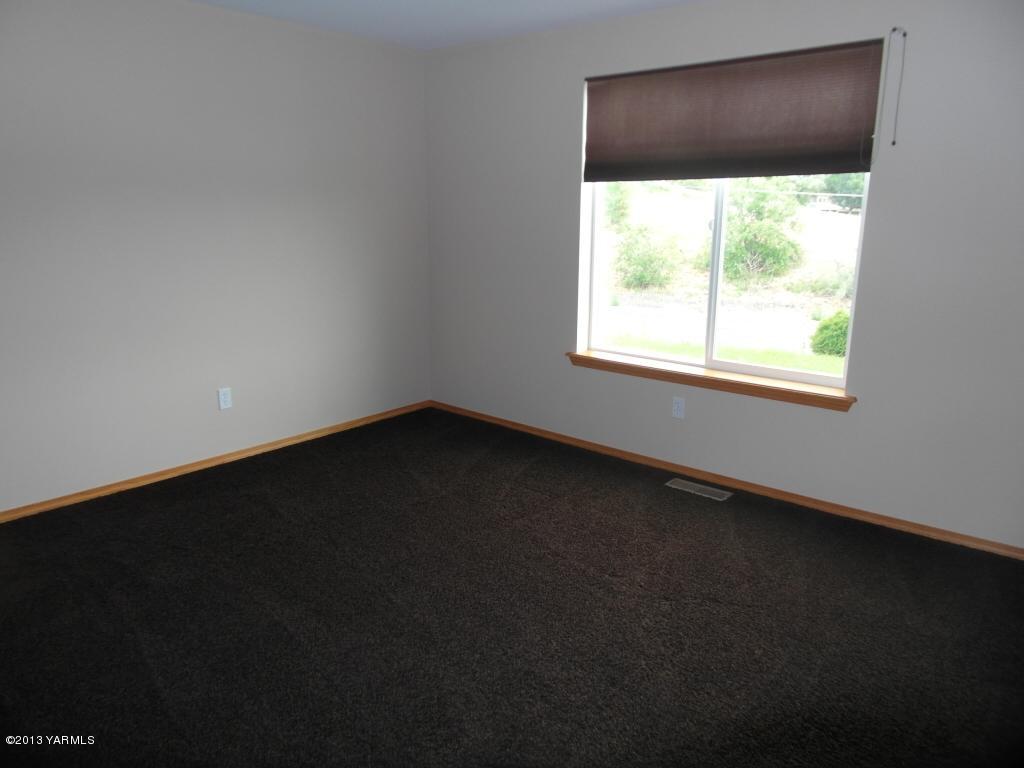 508 Canyon Road Yakima, WA 98901 - Photo 19 of 31 a view of an empty room with a window