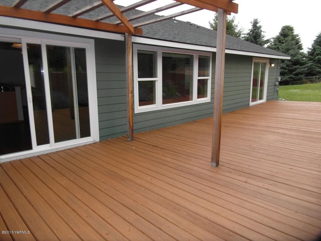 508 Canyon Road Yakima, WA 98901 - Photo 25 of 31 a view of a house with wooden deck