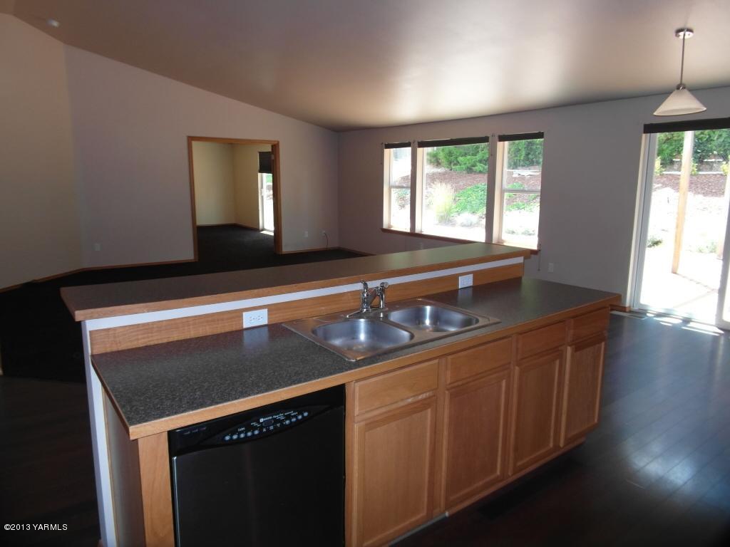 508 Canyon Road Yakima, WA 98901 - Photo 8 of 31 a kitchen with a sink and a window