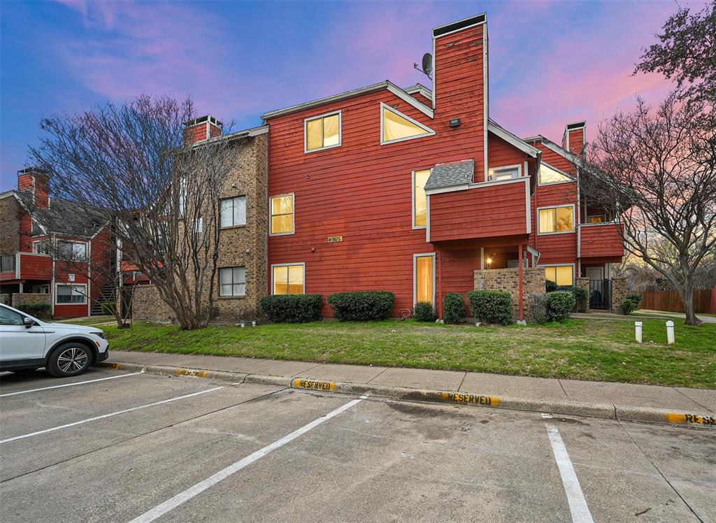 9825 Walnut Street, Unit 206 Dallas, TX 75243 - Photo 1 of 35 a front view of a building with trees