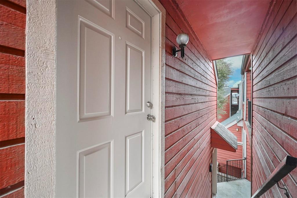 9825 Walnut Street, Unit 206 Dallas, TX 75243 - Photo 12 of 35 a view of front door and deck