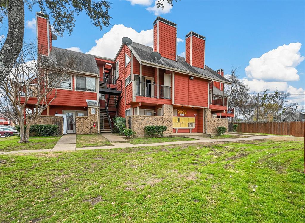 9825 Walnut Street, Unit 206 Dallas, TX 75243 - Photo 2 of 35 a front view of residential houses with yard and trees