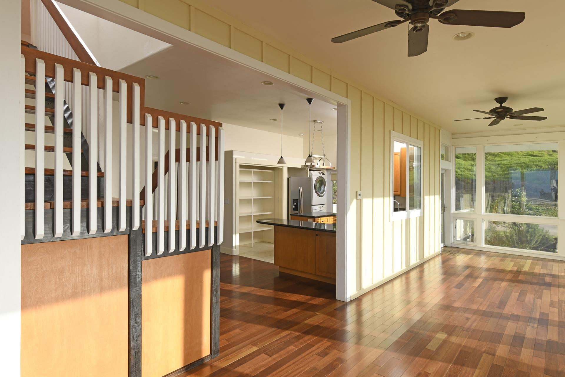 210 Napoko Place Kula, HI 96790 - Photo 13 of 37 Main level living / kitchen areas. Stairway to finished upper acttic / work / storage area.