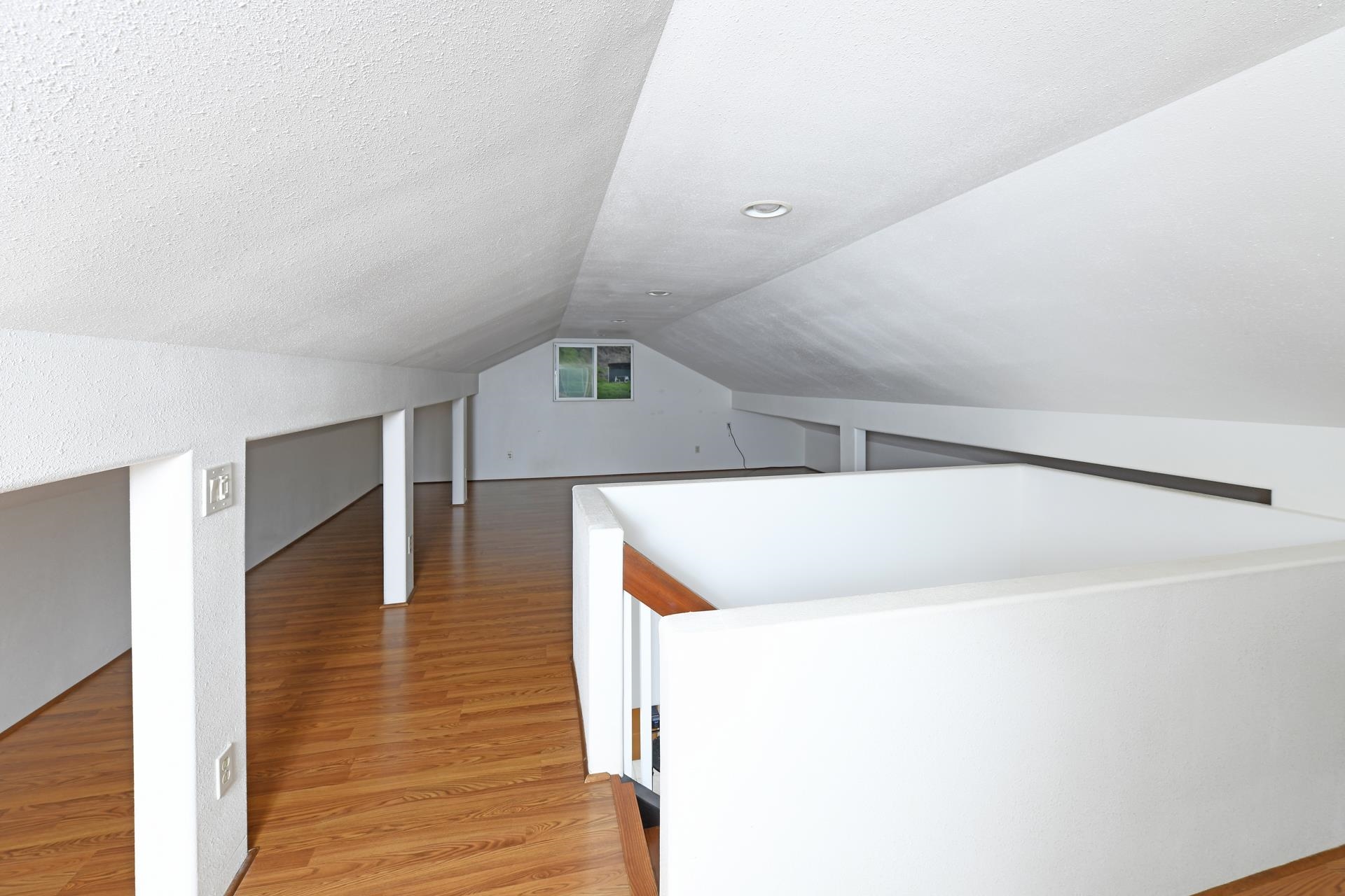210 Napoko Place Kula, HI 96790 - Photo 25 of 37 Top of stairs in the finished upper acttic/ work /storage area