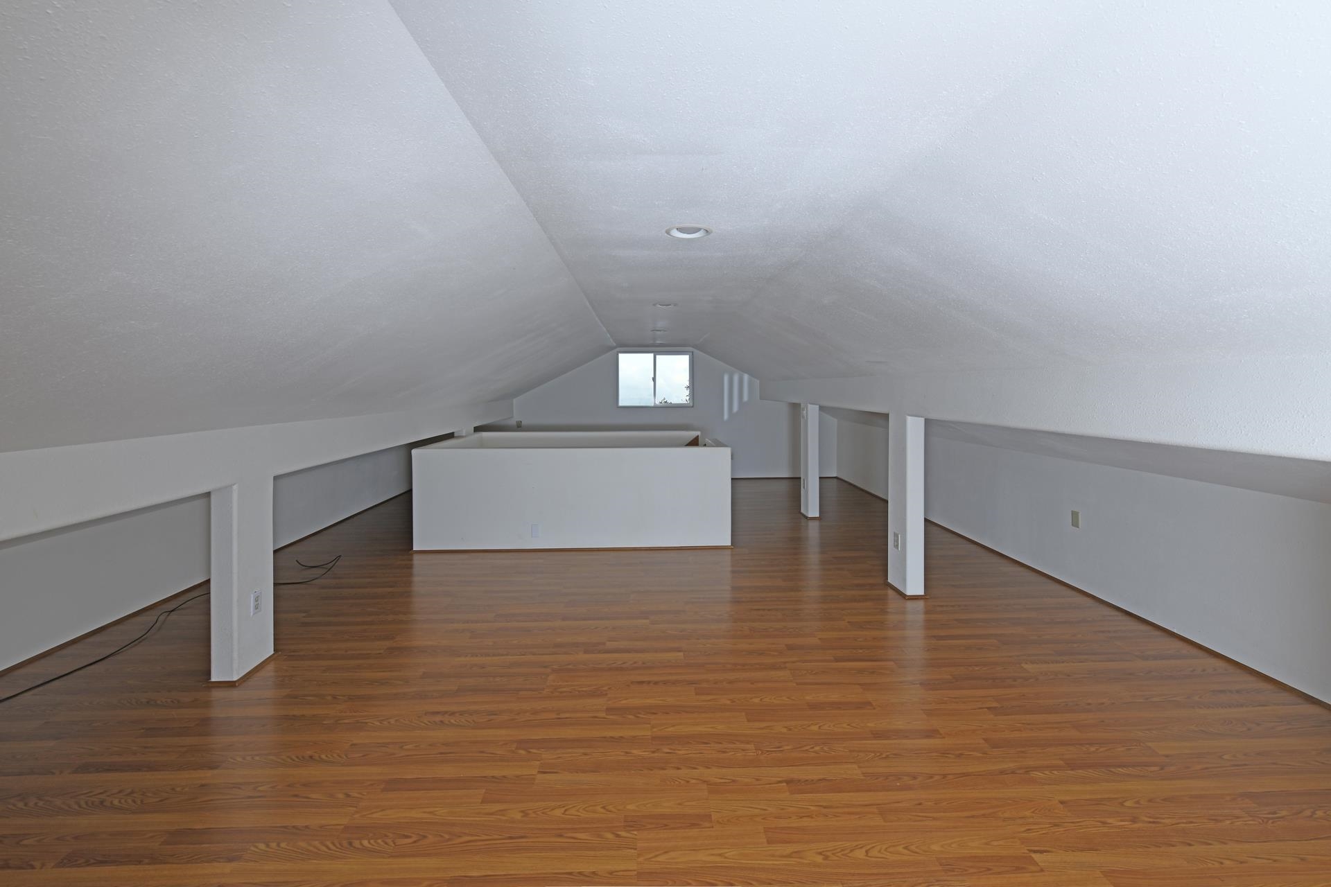 210 Napoko Place Kula, HI 96790 - Photo 26 of 37 Finished upper acttic work/storage area