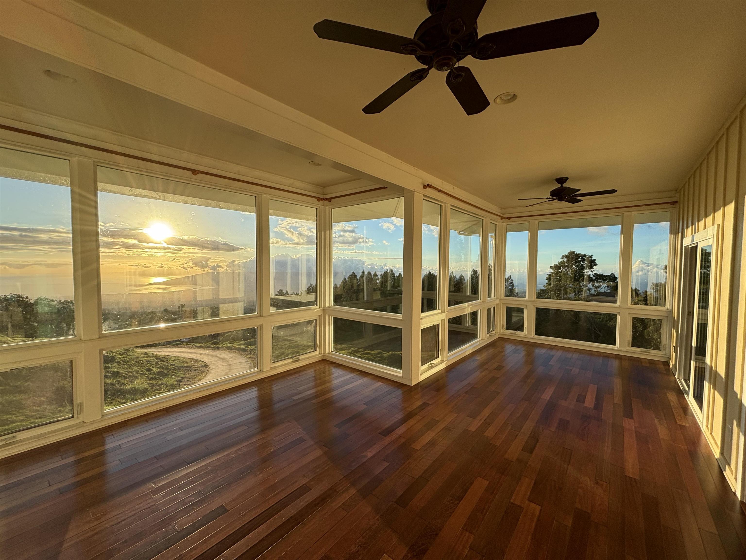 210 Napoko Place Kula, HI 96790 - Photo 8 of 37 Interior main living area with supberb ocean / sunset views