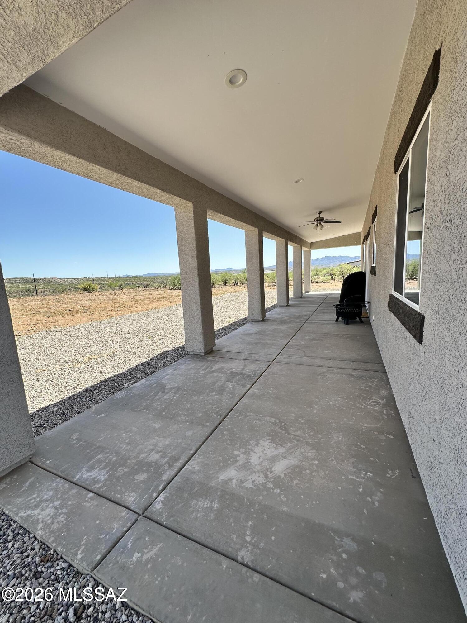 117 Ver Patria Rio Rico, AZ 85648 - Photo 26 of 28 a view of an empty room with a fireplace