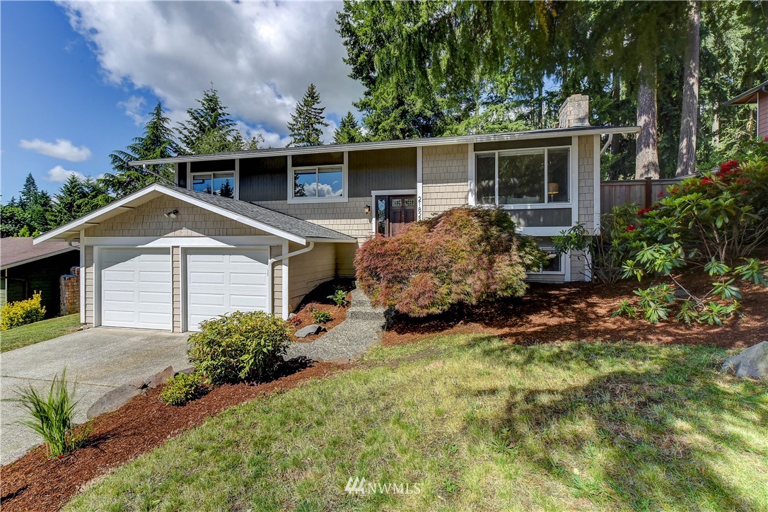 21828 Meridian Avenue South Bothell, WA 98021 - Photo 1 of 31 front view of a house with a yard