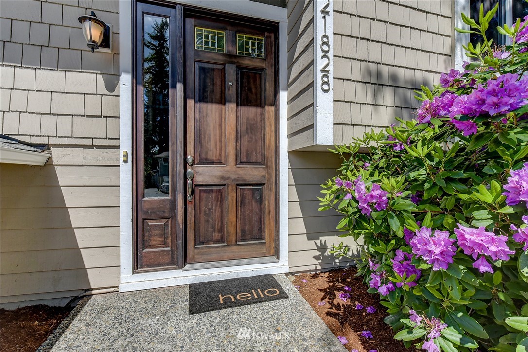 21828 Meridian Avenue South Bothell, WA 98021 - Photo 2 of 31 a house with a flower garden