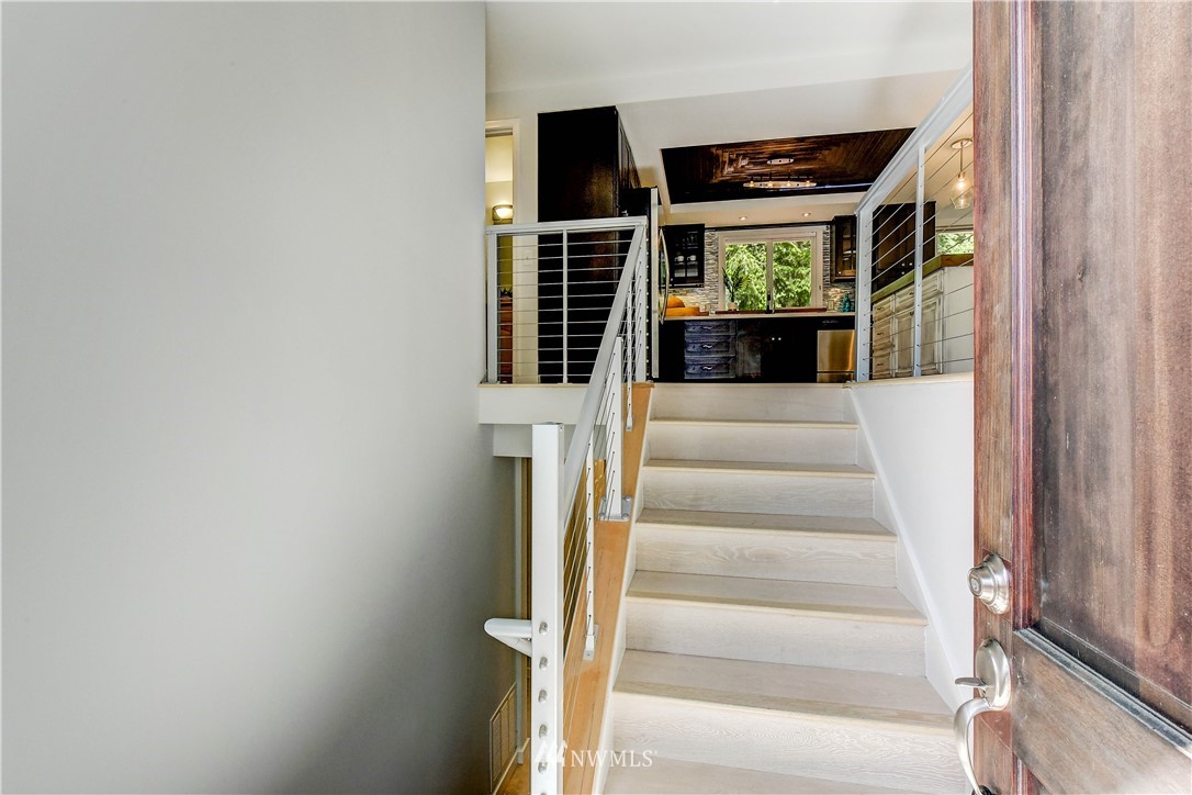 21828 Meridian Avenue South Bothell, WA 98021 - Photo 3 of 31 a view of staircase with white walls and windows