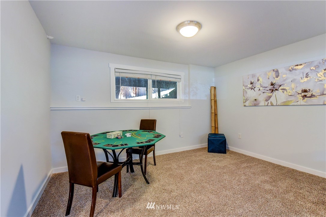 21828 Meridian Avenue South Bothell, WA 98021 - Photo 21 of 31 a view of a livingroom with furniture and wooden floor