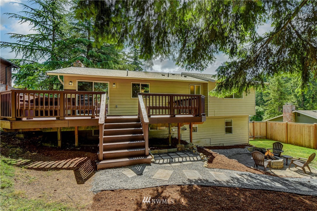 21828 Meridian Avenue South Bothell, WA 98021 - Photo 28 of 31 a front view of a house with a yard
