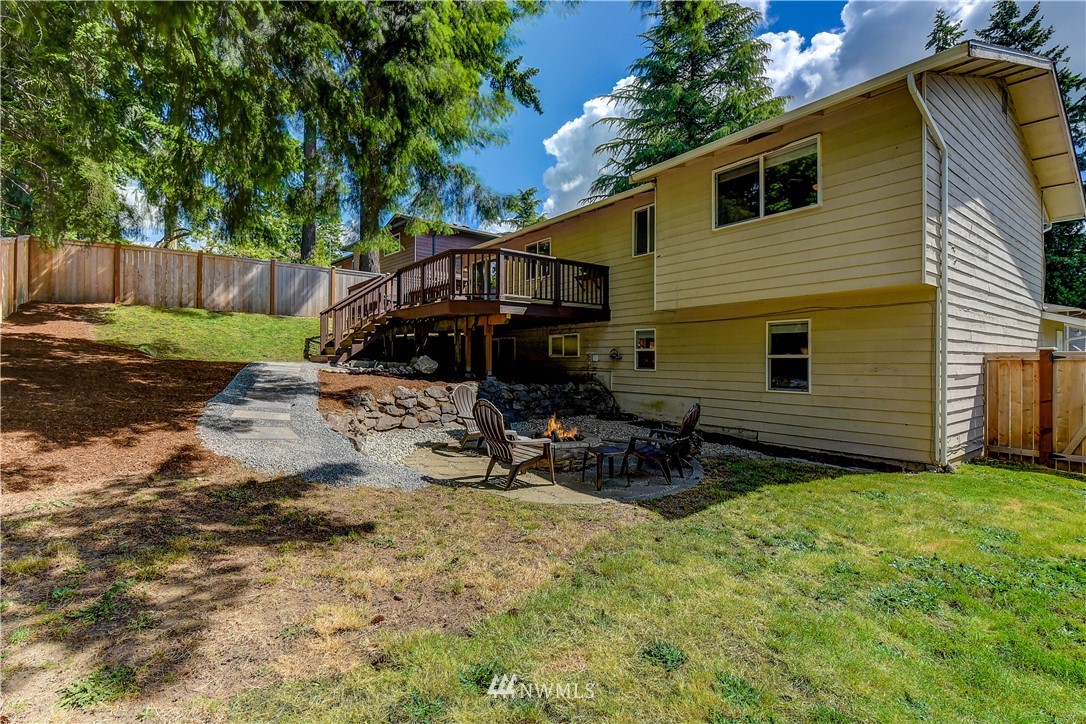 21828 Meridian Avenue South Bothell, WA 98021 - Photo 29 of 31 a view of a house with backyard and a tree