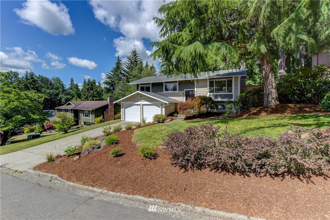 21828 Meridian Avenue South Bothell, WA 98021 - Photo 30 of 31 a front view of a house with garden