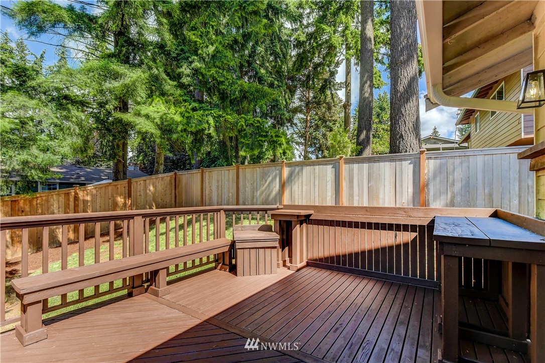 21828 Meridian Avenue South Bothell, WA 98021 - Photo 8 of 31 a view of deck with wooden floor and outdoor seating