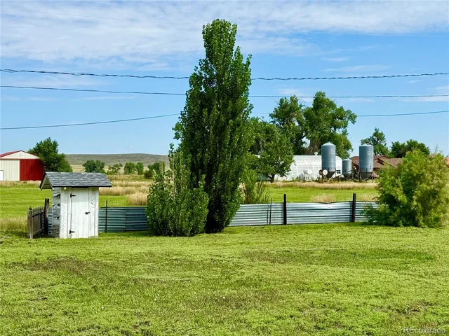 a view of a bench in the garden