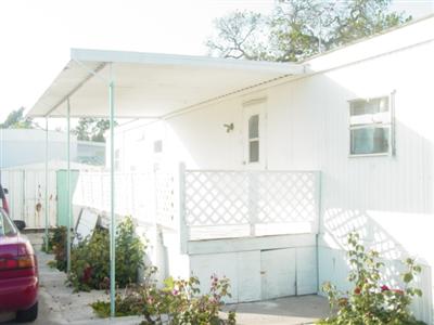 3309 Santa Rosa Avenue, Unit 28 Santa Rosa, CA 95407 - Photo 1 of 8 a front view of a house with a yard