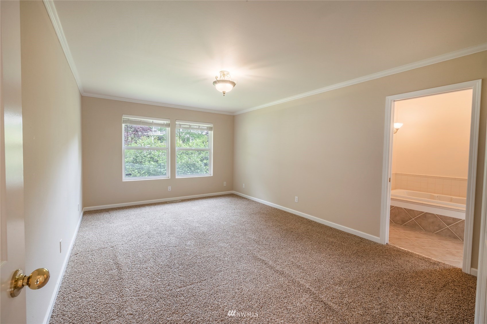 2802 Tracyton Beach Road Northwest Bremerton, WA 98310 - Photo 12 of 40 an empty room with windows
