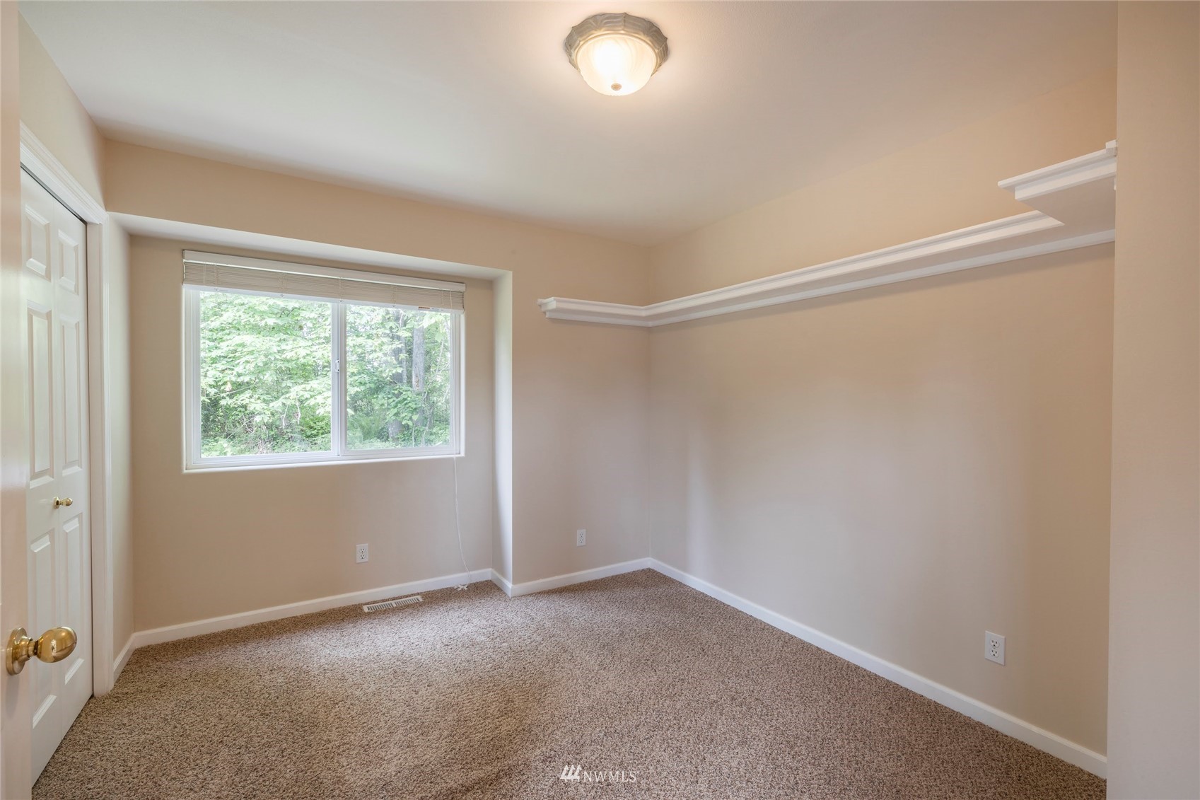 2802 Tracyton Beach Road Northwest Bremerton, WA 98310 - Photo 21 of 40 a view of an empty room with a window