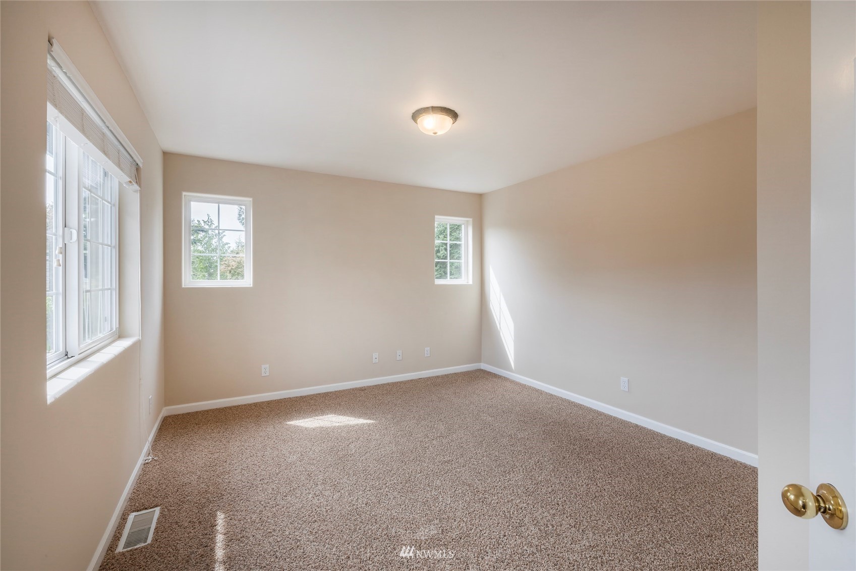 2802 Tracyton Beach Road Northwest Bremerton, WA 98310 - Photo 22 of 40 a view of an empty room with a window