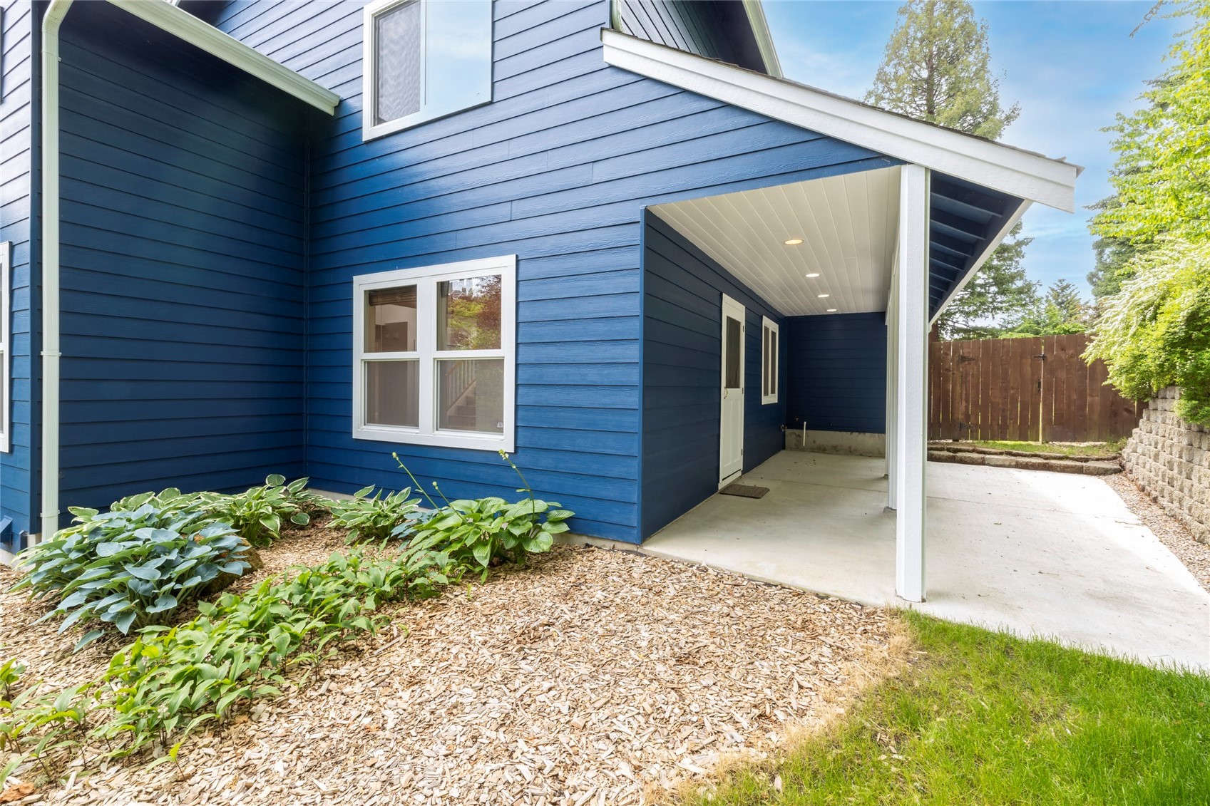 2802 Tracyton Beach Road Northwest Bremerton, WA 98310 - Photo 29 of 40 a view of a house with a yard