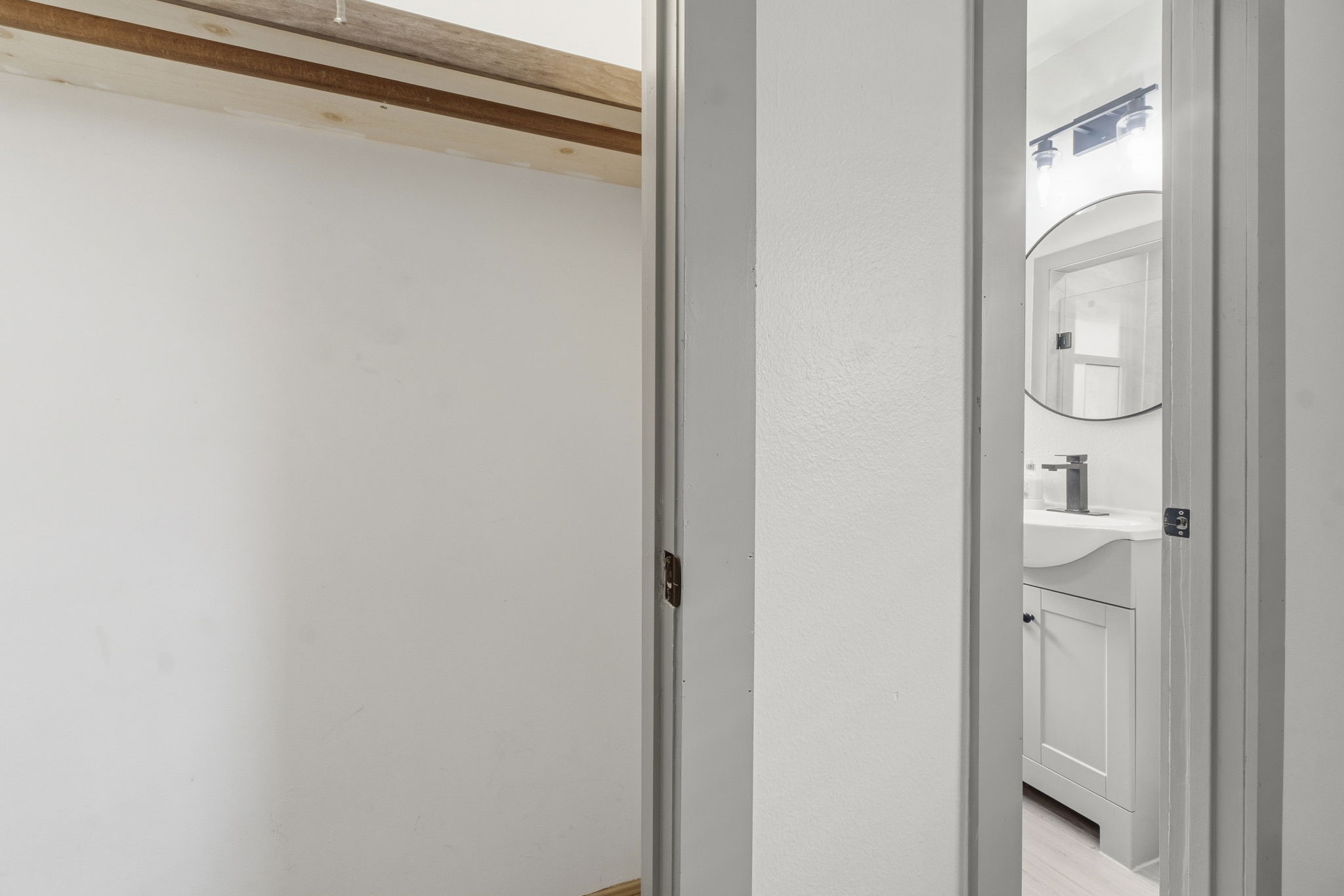 14850 Coaltown Road Willis, TX 77378 - Photo 26 of 41 Spacious walk-in closet providing ample storage and organization space conveniently located off the primary bathroom.