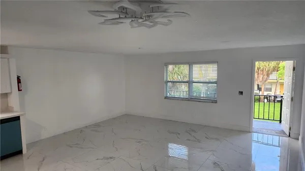 an empty room with windows