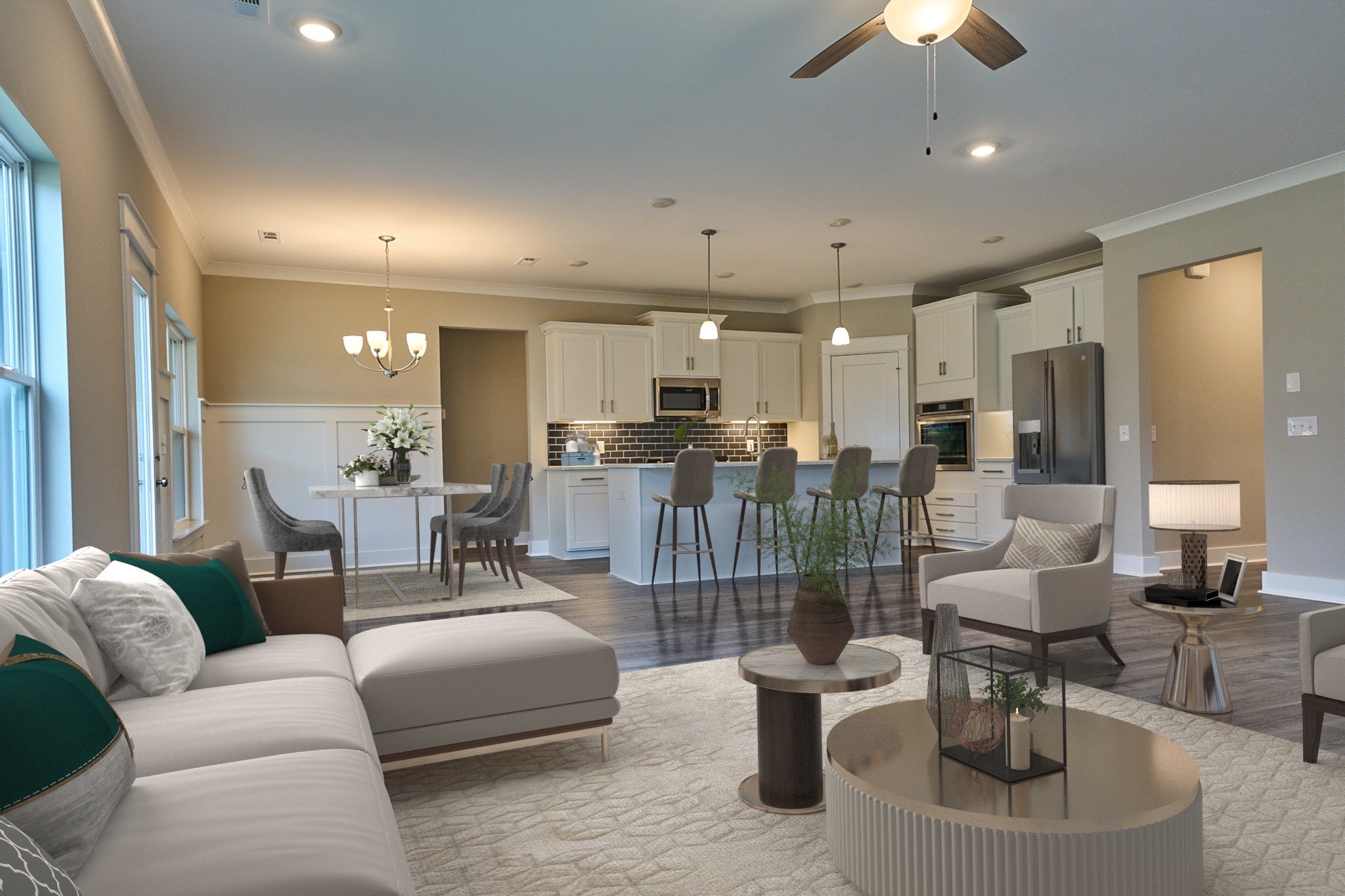 a living room with furniture and a view of kitchen