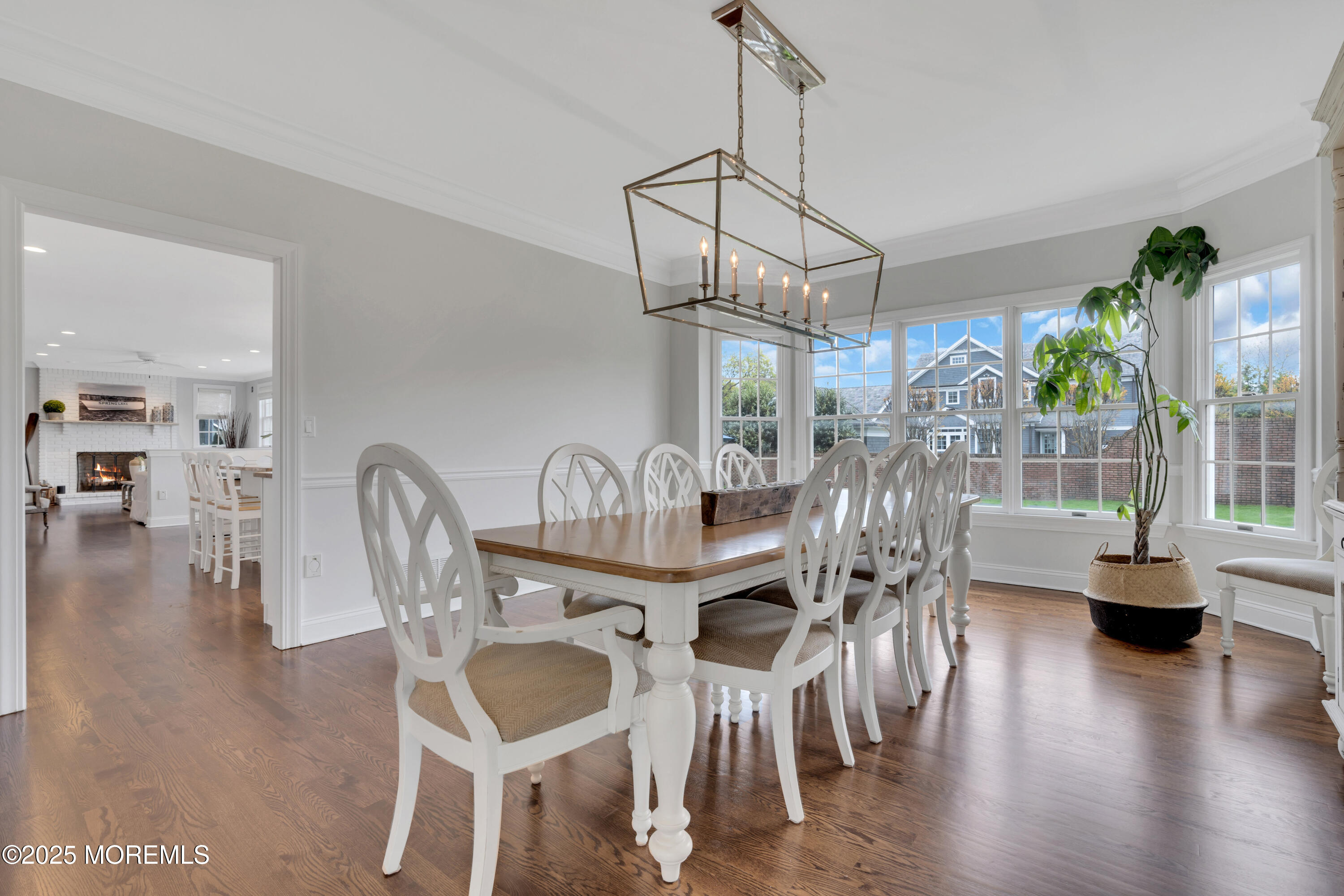 201 Jersey Avenue Spring Lake, NJ 07762 - Photo 18 of 29 a dining room with furniture window and wooden floor