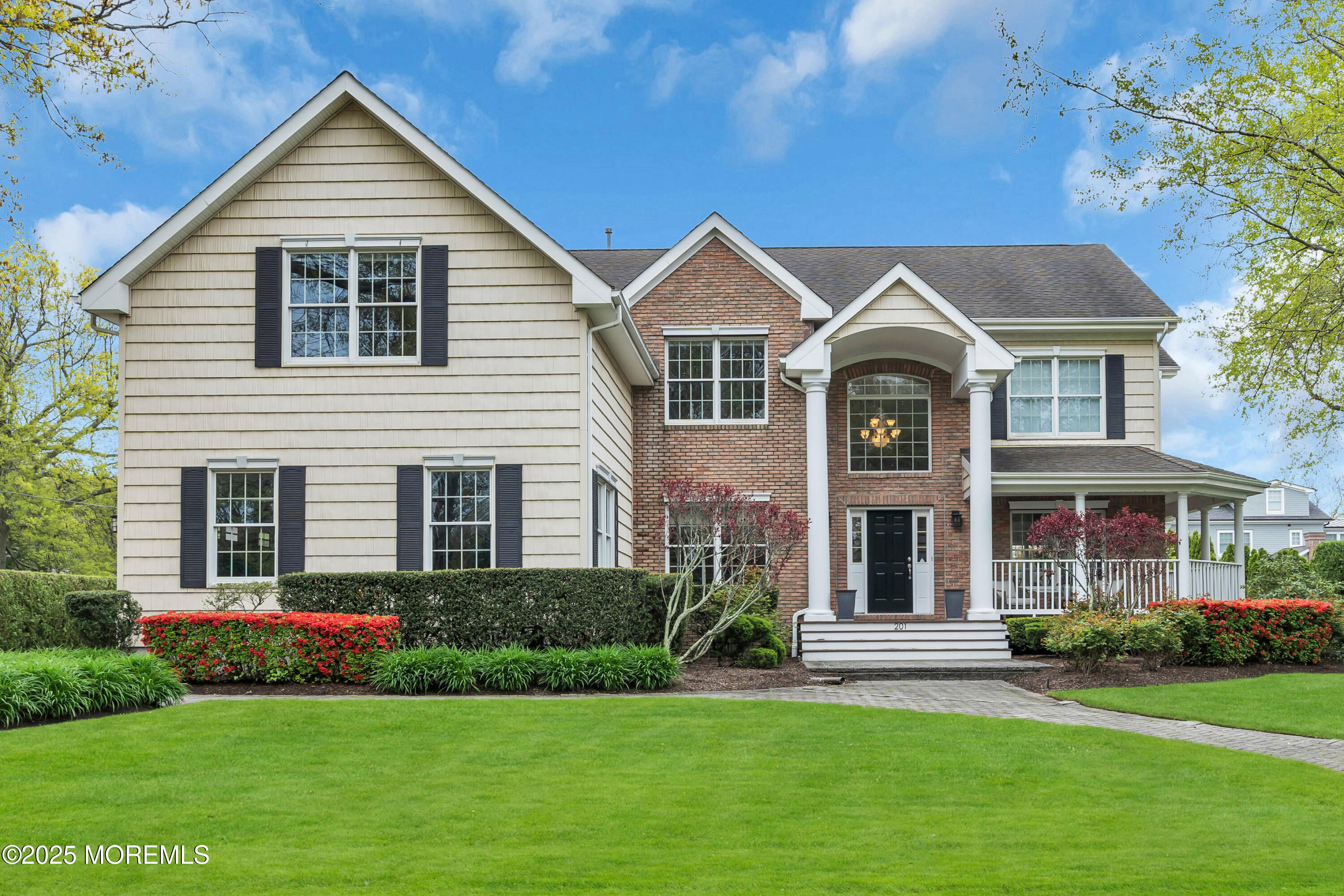 201 Jersey Avenue Spring Lake, NJ 07762 - Photo 2 of 29 a front view of a house with a yard