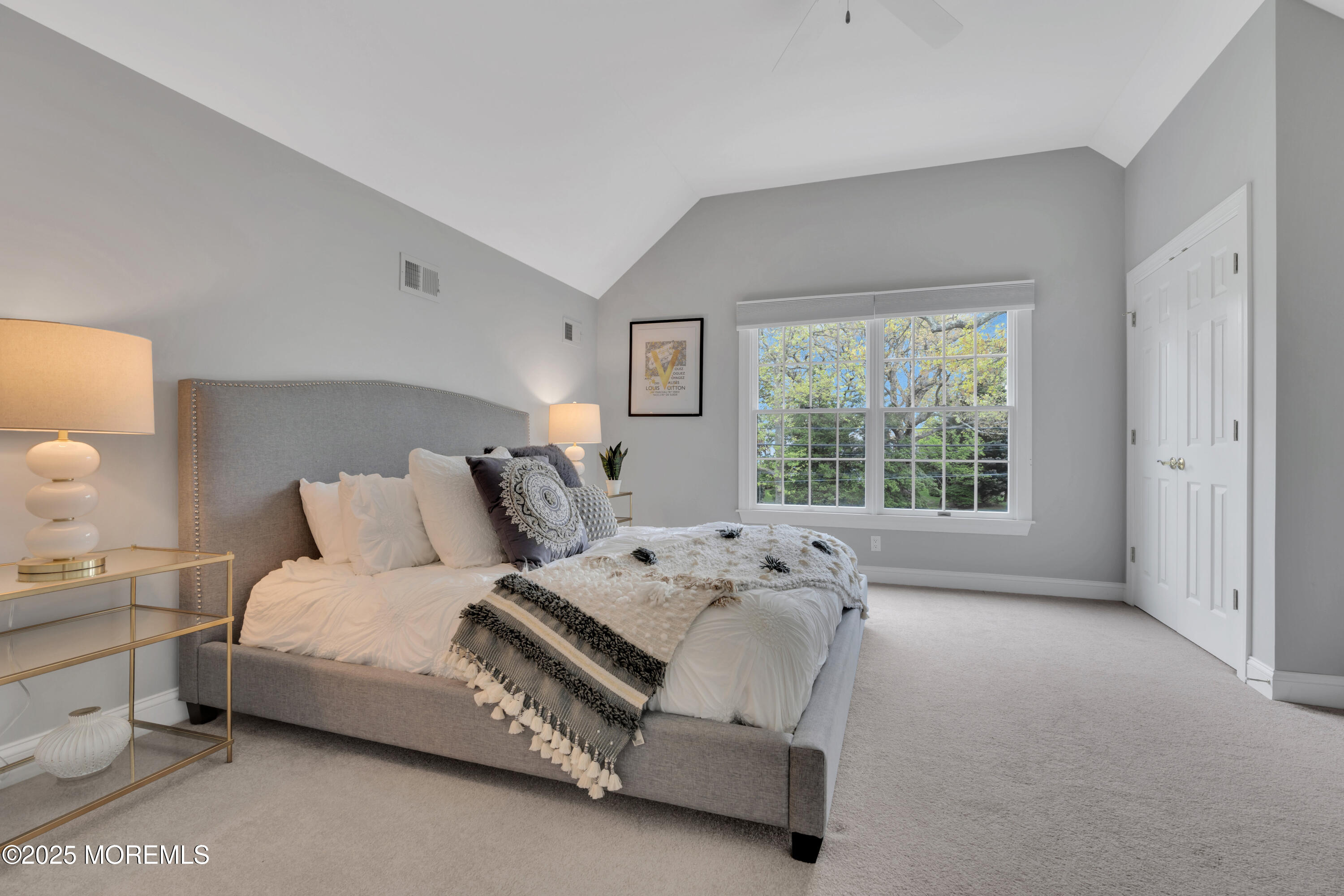 201 Jersey Avenue Spring Lake, NJ 07762 - Photo 23 of 29 a bedroom with a bed and a large window
