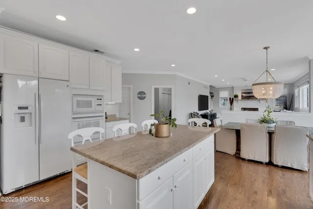 a kitchen with counter space cabinets and appliances
