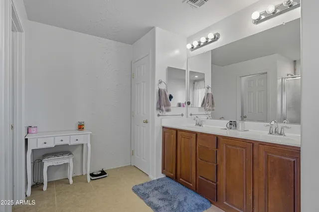 a bedroom with furniture and a bed