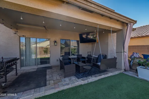 a view of an house with backyard space and garden