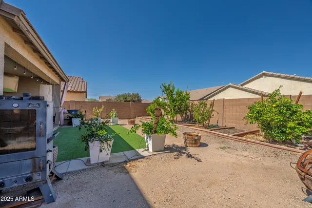 a house view with a seating space and garden