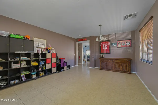 a kitchen with cabinets a sink and appliances