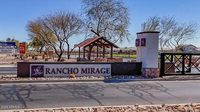 an aerial view of a swimming pool and lake view