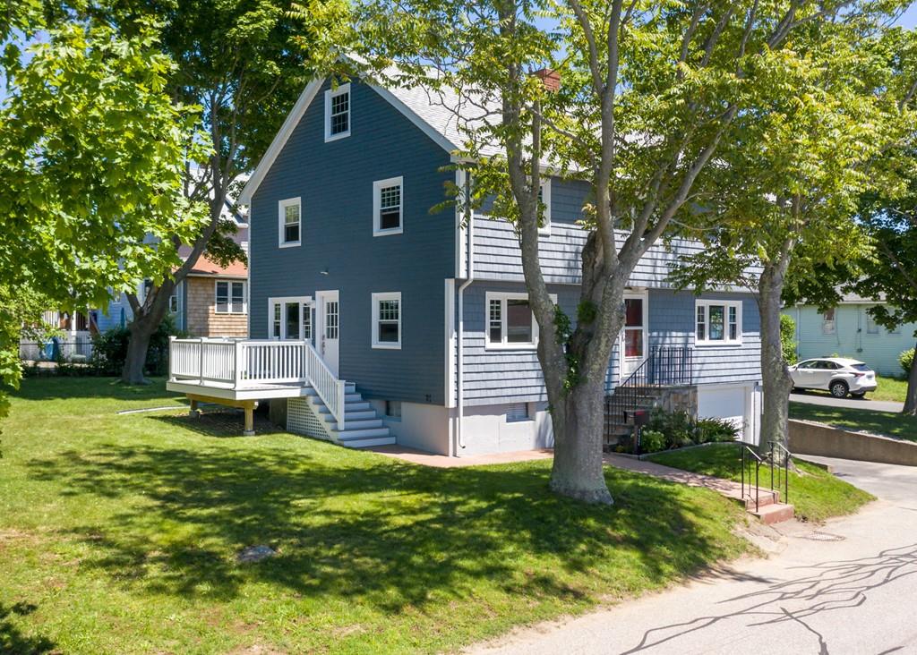 122 Edgewater Road Hull, MA 02045 - Photo 1 of 24 a house view with a garden space