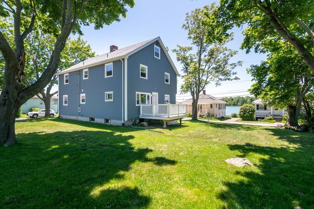 122 Edgewater Road Hull, MA 02045 - Photo 21 of 24 a view of house with a yard