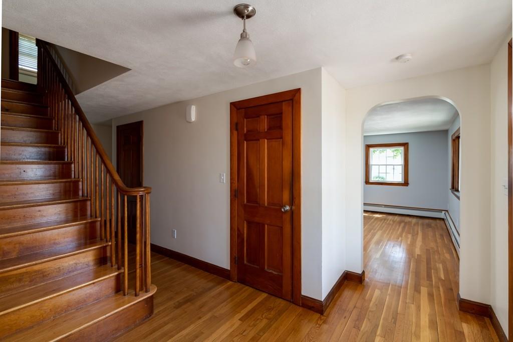 122 Edgewater Road Hull, MA 02045 - Photo 5 of 24 a view of entryway with wooden floor